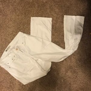 White bootcut jeans.